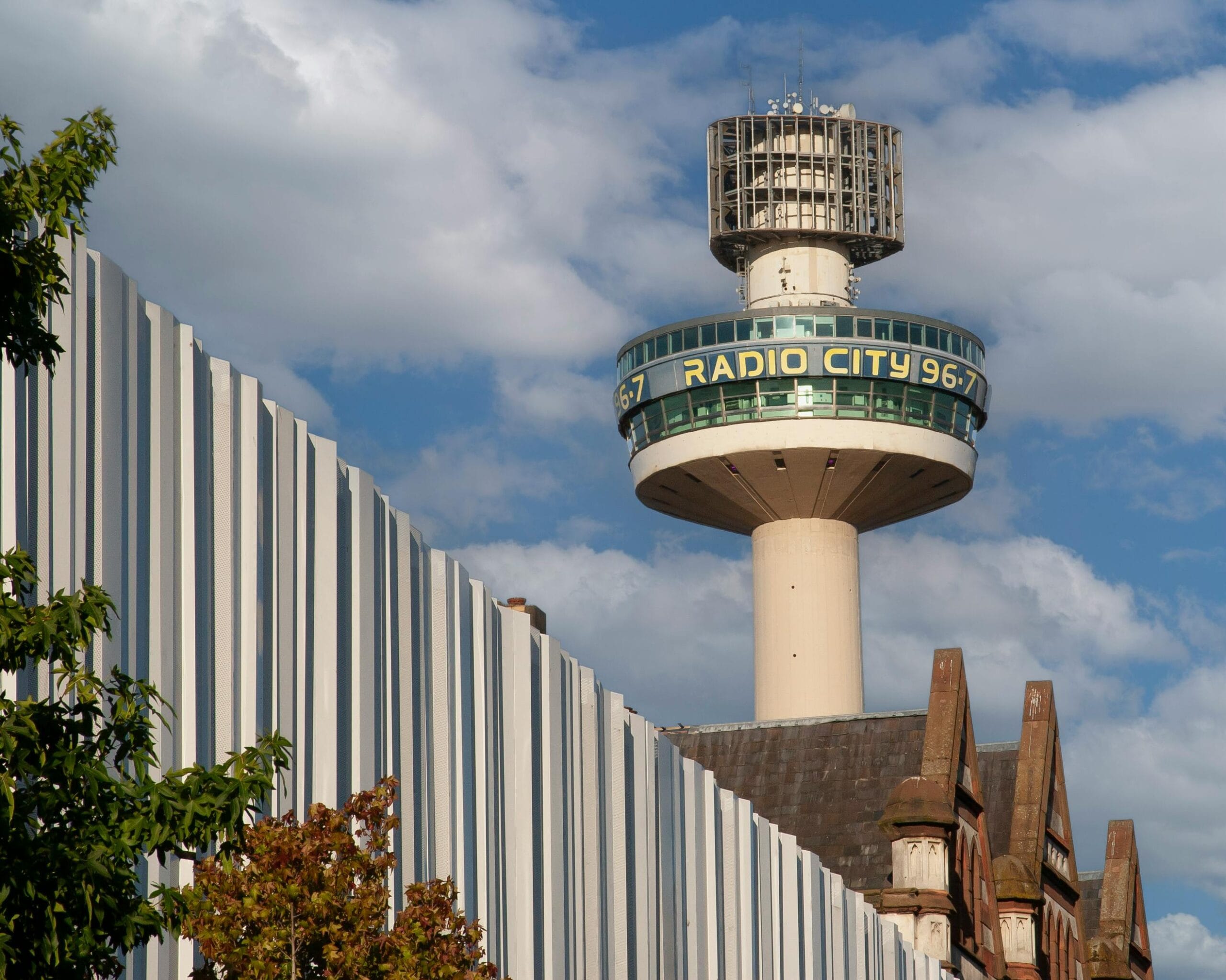 View of Liverpool’s Radio City Tower against a clear sky, showcasing urban architecture.